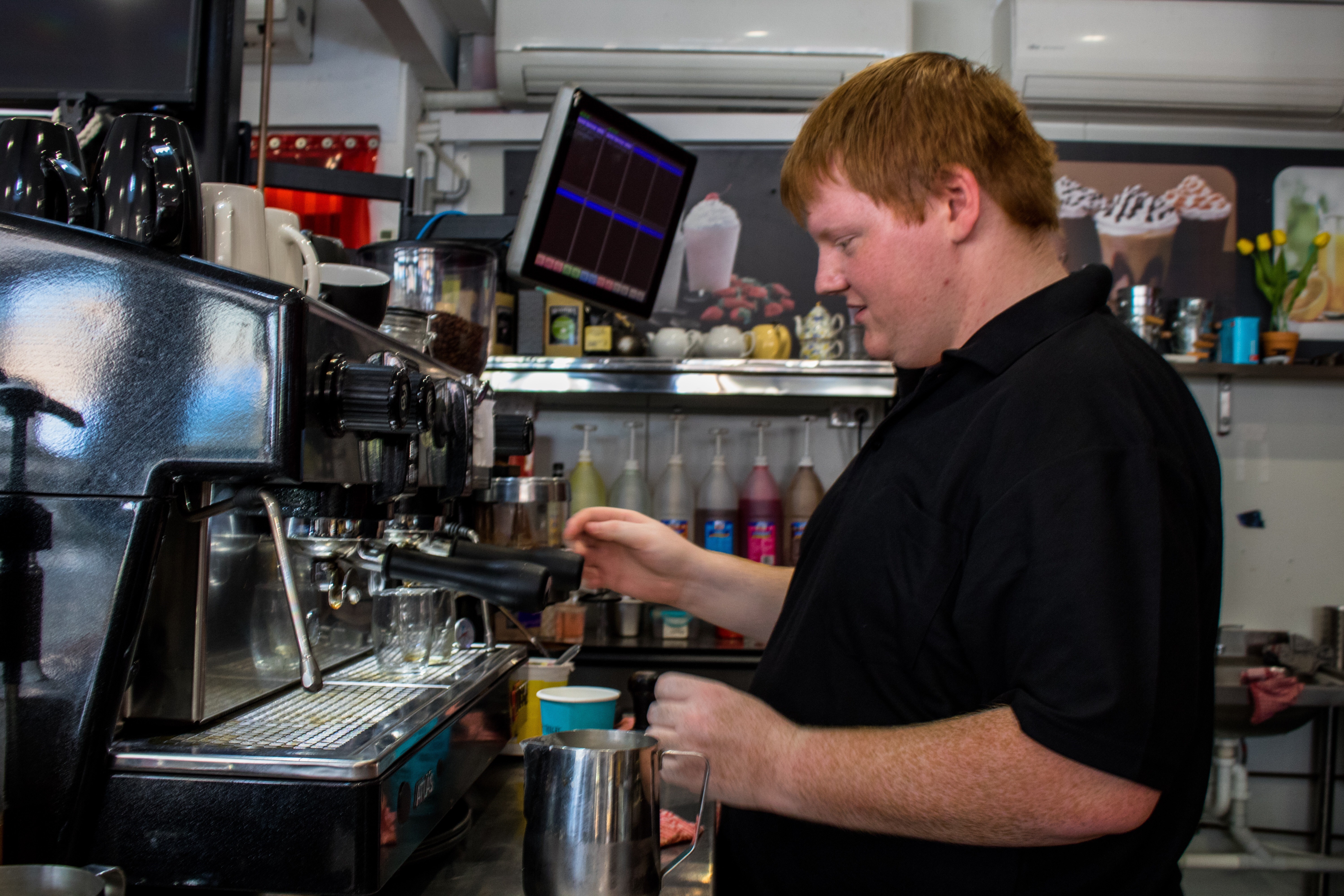 Zach lands his first job out of school at a friendly, local café